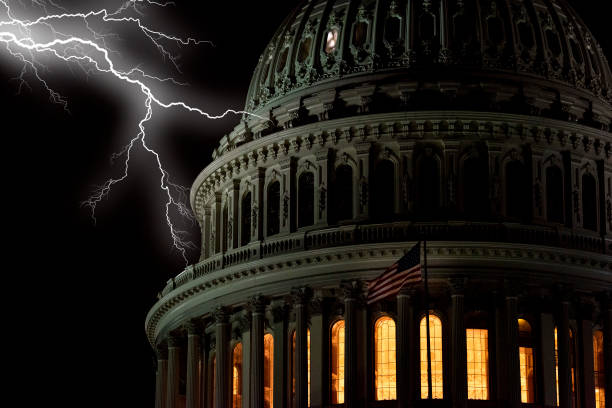 istock lightning on Washington DC Capitol view at night 1215688898