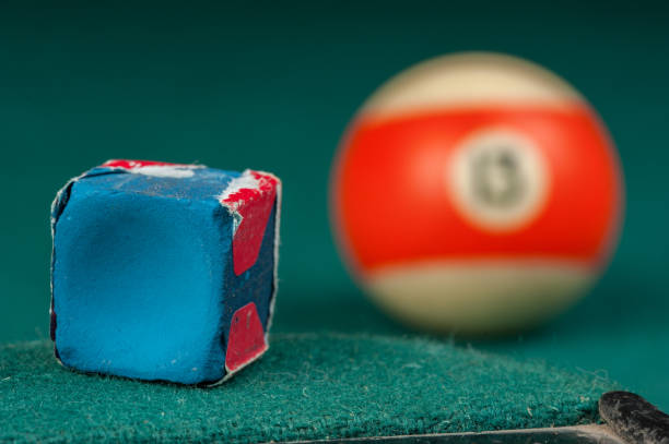 istock Billiards balls and cue on billiards table. Billiard sport concept 1215690053