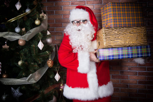 istock Funny Santa Claus and Christmas tree. 1215691804