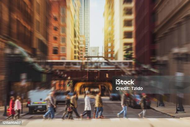 Blurred Crowd Of Chicago Street With Traffic Road Intersection Among Modern Buildings Stock Photo - Download Image Now