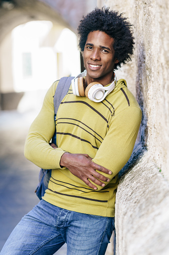 Cuban Black man with afro hair sightseeing in Granada, Andalusia, Spain.