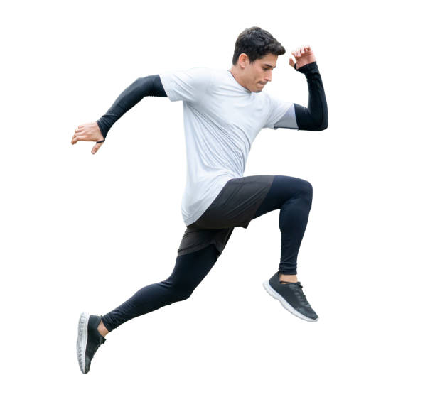 young fitness man in sportwear running isolated on white background with clipping path. exercise runner , jumping guy , workout ,sport ,training. side view stock photo