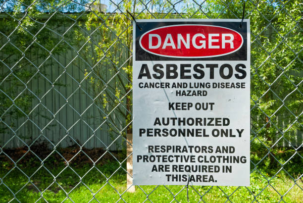 asbestos warning sign - confined space safety danger sign imagens e fotografias de stock