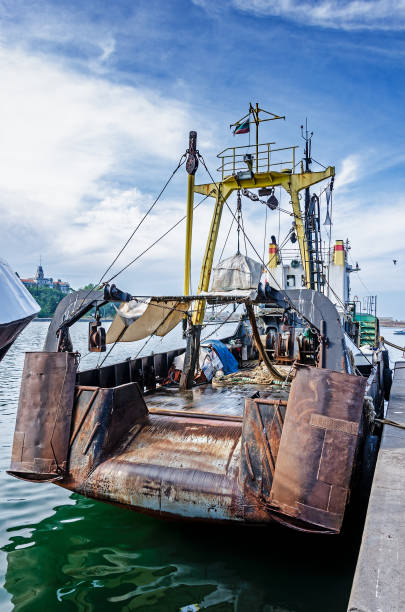 istock Old rusty fishing ship moored in harbor 1215698580