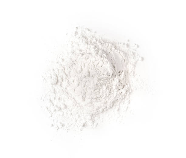 istock Pile of flour isolated on white background .top view 1215698797