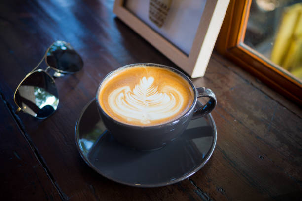 istock hot coffee cup on table at morning, relax time, latte coffee 1215699177