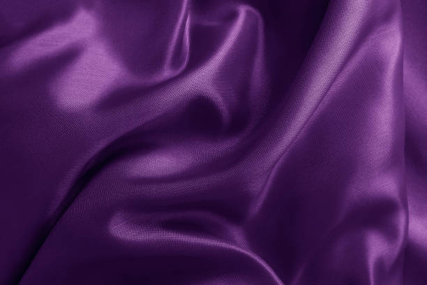 istock Purple fabric cloth texture for background and design art work, beautiful crumpled pattern of silk or linen. 1215699290