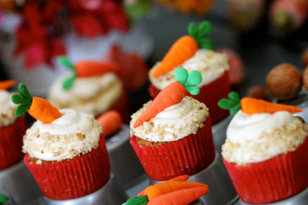 Easter cupcakes baked with carrot decorated with small figures stock photo
