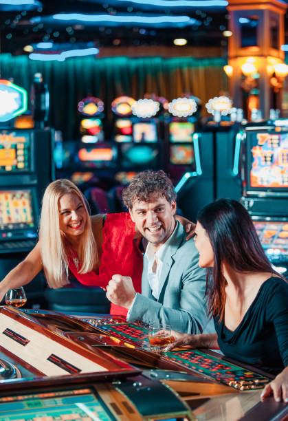 istock People gambling in the casino 1215700212