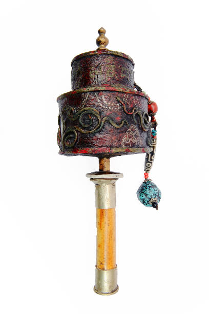 istock Buddhist prayer wheels isolated on white background 1215700672