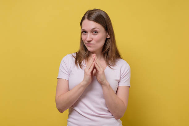 istock Happy pensive woman planning her weekend. Studio shot 1215700752