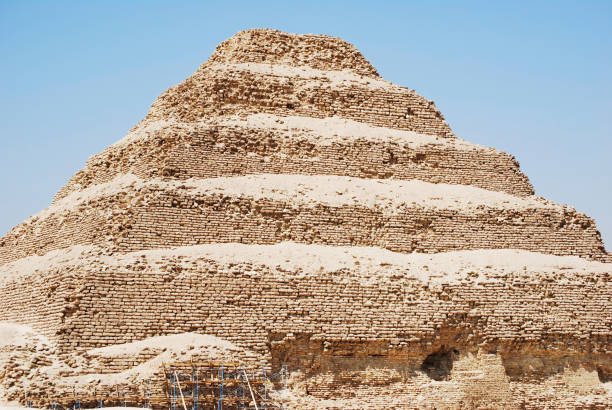 the ancient pyramid of sakkara. also known as: step pyramid, the first pyramid of egypt - the step pyramid of zoser imagens e fotografias de stock