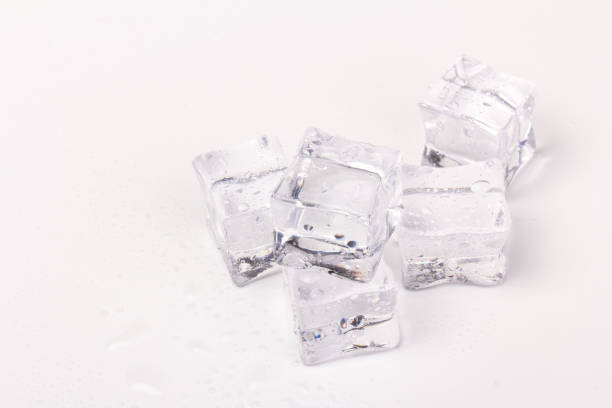 istock ice cubes in close-up on white background 1215701019