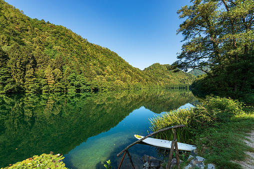 Lago di Levico, small beautiful lake in Italian Alps, Valsugana valley, Levico Terme town, Trento province, Trentino Alto Adige, Italy, Europe