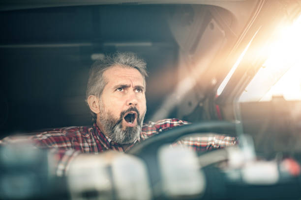 istock Mature truck driver encountering a traffic accident. 1215705175