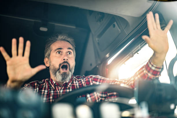 istock Mature truck driver encountering a traffic accident. 1215705459
