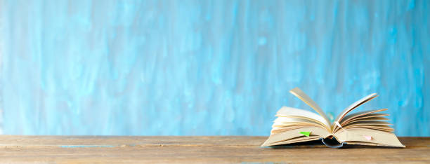 istock open book, reading, education at home, literature, learning, relaxing, book fair concept.Selective focus, copy space. 1215705854
