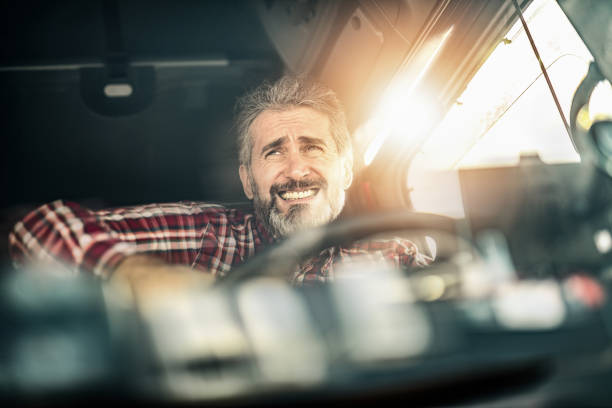 istock Mature truck driver encountering a traffic accident. 1215705968