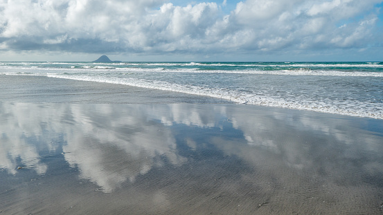Photo was made in Whakatane, New Zealand, Bay of Plenty. In the distance Moutohora Island