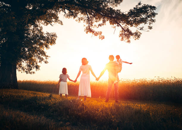 istock family on autumn walk 1215709919