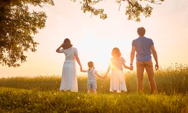 istock family on autumn walk 1215710049