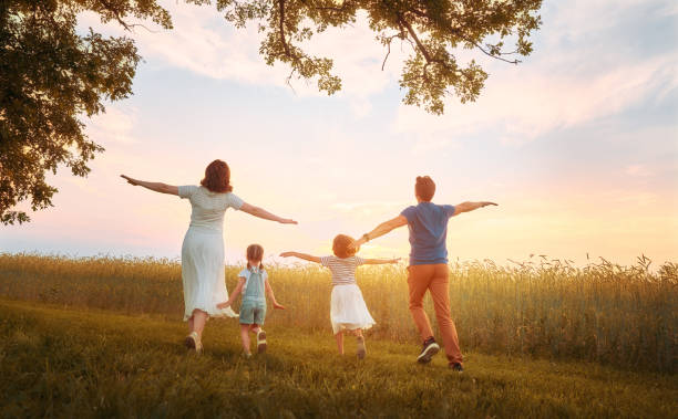 istock family on autumn walk 1215710487