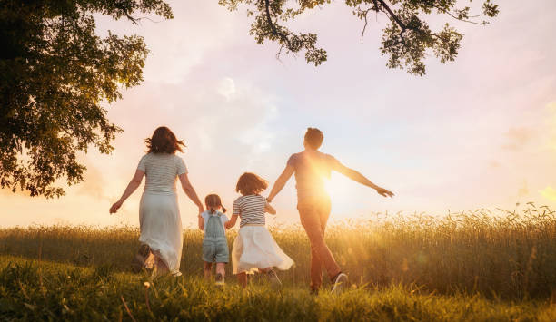 istock family on autumn walk 1215710501