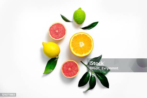 Bunch Of Sliced Citric Fruits Isolated On White Background Stock Photo - Download Image Now