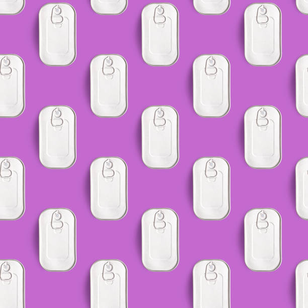 istock Seamless pattern of cans on purple background 1215712068