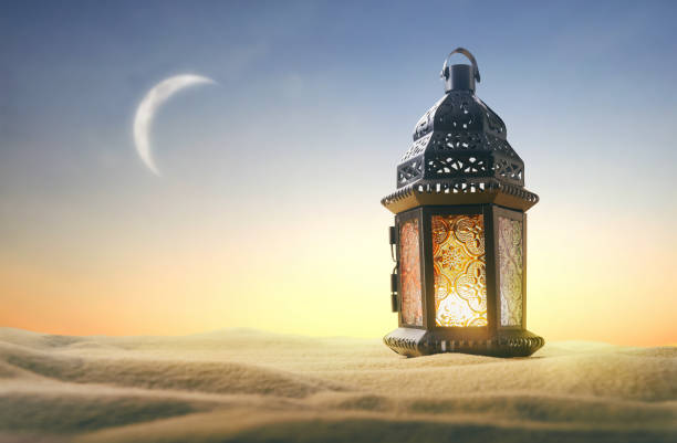 istock Ornamental Arabic lantern with burning candle 1215713683