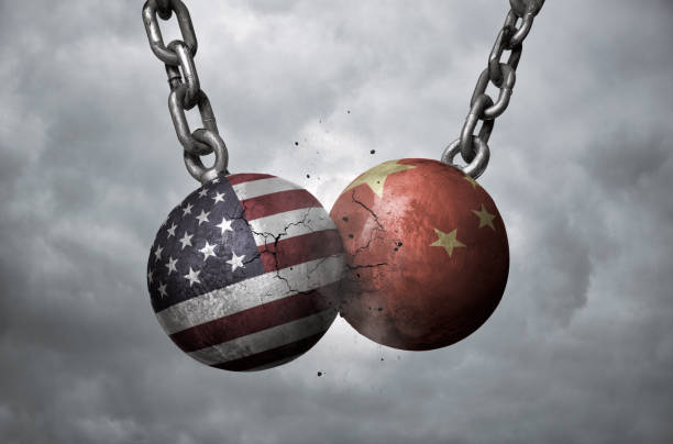 USA and China trade war concept Two wrecking balls with american and chinese flags hitting each other, trade war concept china stock pictures, royalty-free photos & images