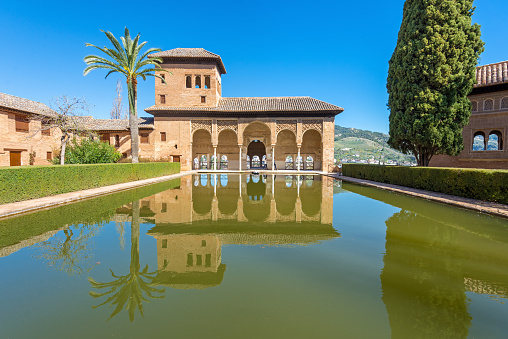 Wide angle view of The Tower of the Ladies, The Partal, Alhambra, Granada, Spain