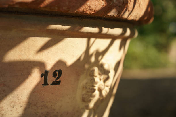 Terracotta vase with number twelve stock photo