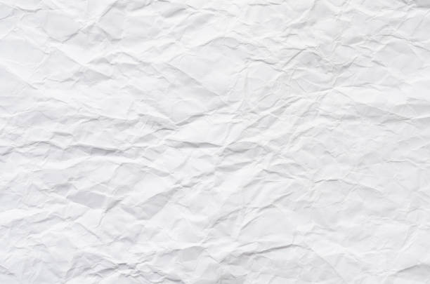 white crumpled paper texture background. - at the edge of cut or torn paper textured effect paper imagens e fotografias de stock