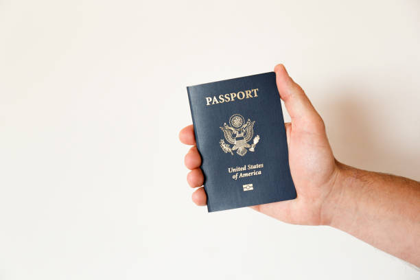 istock Passport of the US citizen. Identification document over bright background. 1215721396