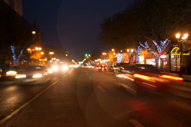istock Abstract defocused image of busy streetscape at night 1215722843