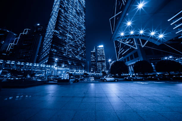 Up looking Skyscrapers with skyline in Shanghai financial district at night.