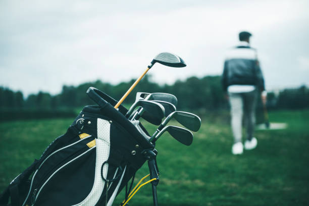 istock Close-up shot of a golf bag in a golf course 1215725066