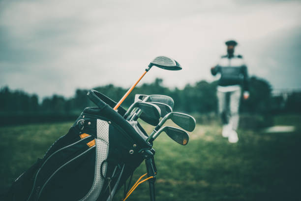 istock Close-up shot of a golf bag in a golf course 1215725224