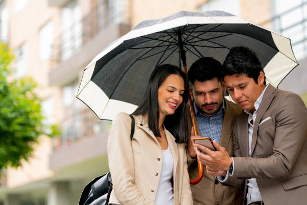 istock Office mates ask for their street transportation from Uber 1215725900