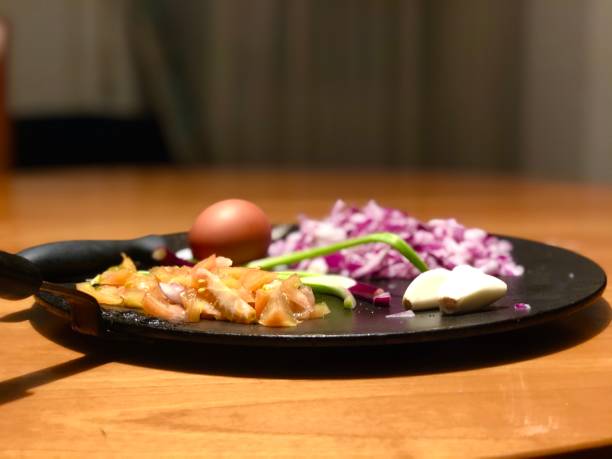 istock omelette preparation egg onions and tomatoes with garlic 1215726261