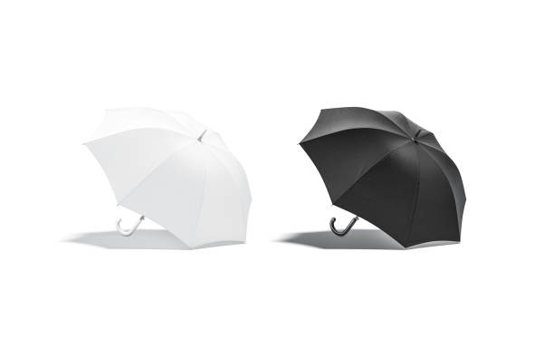 istock Blank black and white open umbrella mockup lying, side view 1215726835