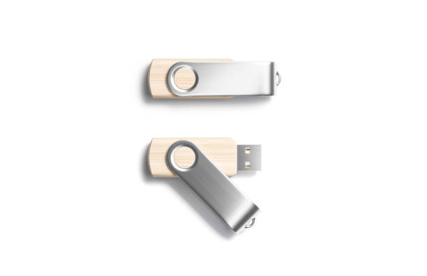 Blank wood opened and closed usb stick silver cap mockup Blank wood opened and closed usb stick with silver cap mockup, 3d rendering. Empty digital modem or flashcard mock up, isolated, side view. Clear portable transfer for private file mokcup template. wooden flash drive stock pictures, royalty-free photos & images
