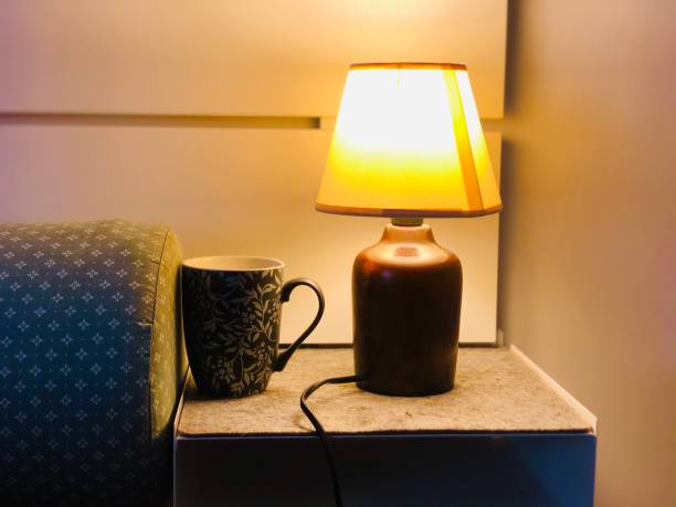 istock Table lamp with sleeping bed in bedroom amazing interior decoration 1215728448