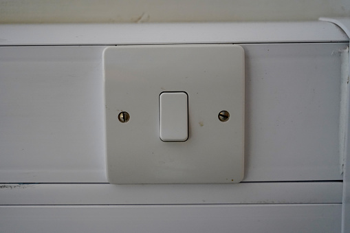 Single light switch on a wall