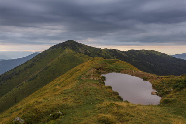 istock small lake in the mountains 1215729468