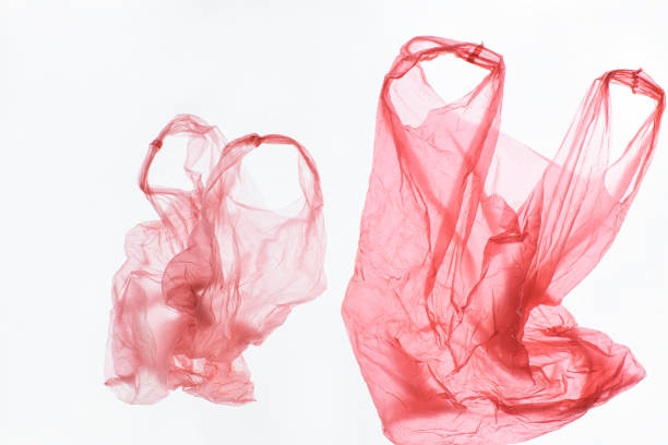 istock Used Red Plastic Bags Isolated on White 1215729998