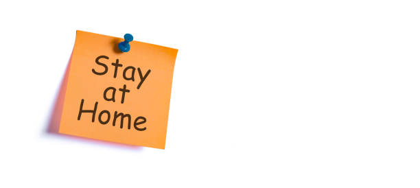istock stay at home concept. warning letter on sticky note paper for coronavirus measures 1215730443