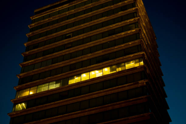 istock building with only one occupied floor at night 1215731644
