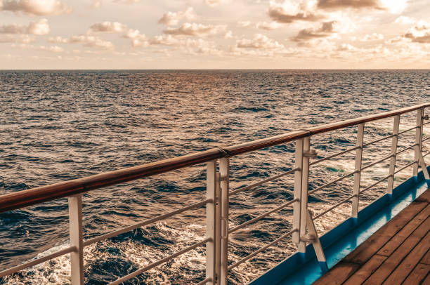 istock Horizon view from empty cruise ship deck on a sunny day 1215732819
